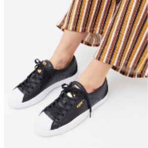 Black leather Puma “Love Grand slam” size 8 in excellent condition